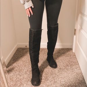 Tall black boots